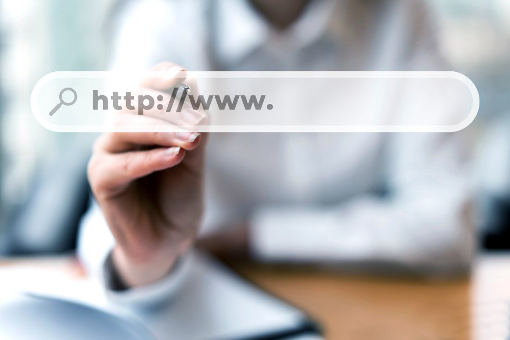 User selecting and registering valuable domain names online in the first days.